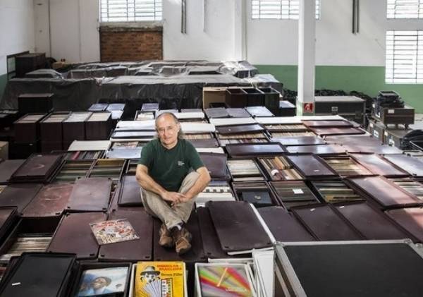 Zero Freitas, 62, over his vinyl records collection at his Sao Paulo warehouse